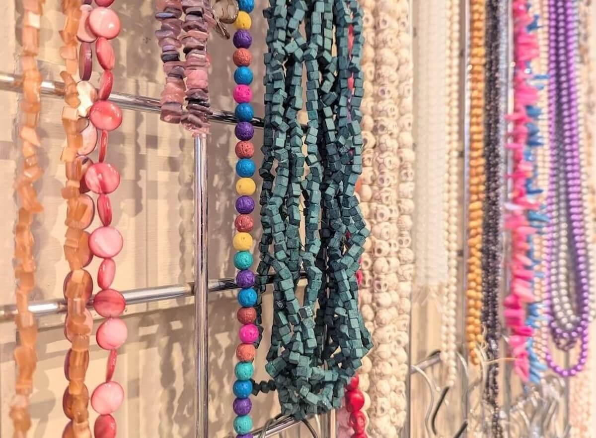 Beadz-Bazaar-bead-shop-in-Frome-wall-of-beads-1200-e1764326760761